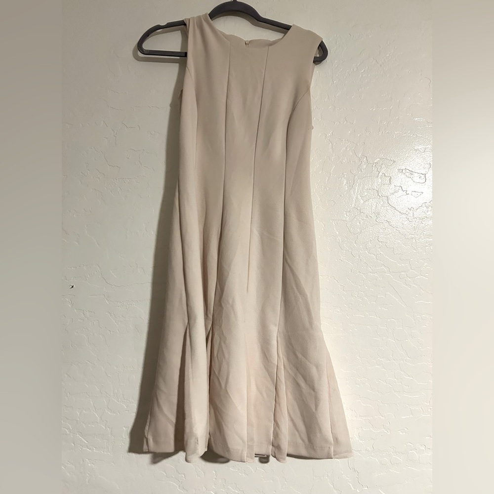 Calvin Klein 
Size 4